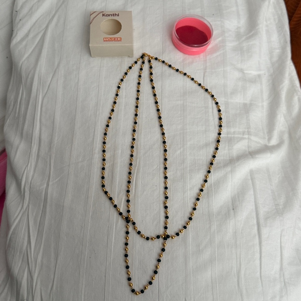 Black and Gold Beaded Necklace from BAPS Shri Swaminarayan Mandir